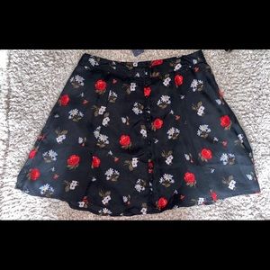 Black skirt with red and blue floral pattern